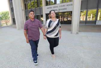 Lead plaintiff Jose Martinez and his mother Jessica Martinez outside U.S. District Court in Bridgeport
