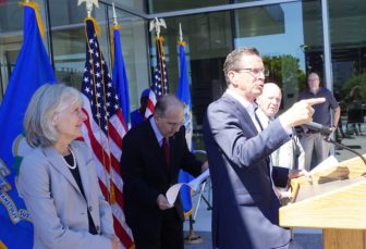 Malloy makes a point. At left is Catherine Smith and Sen. Martin M. Looney.