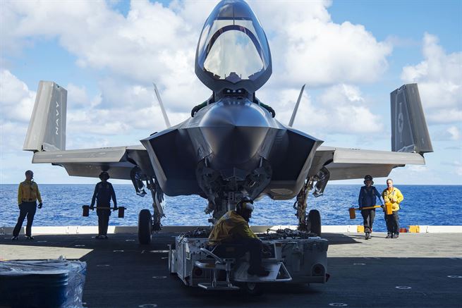 Sailors move an F-35C, the carrier version of the joint strike fighter, during sea trials aboard the USS Dwight D. Eisenhower last year.