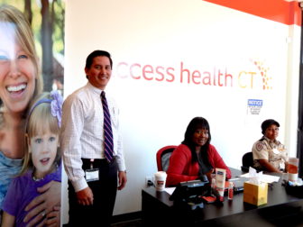 Staff at the Access Health CT enrollment center in New Britain preparing for the open enrollment that ended in January.
