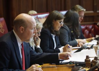 Sen. Joe Markley, the only no vote in the Senate, and colleagues reading the Sikorsky legislation,