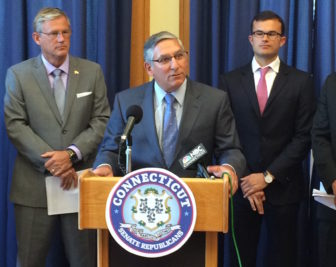 Sen. Len Fasano, R-North Haven, flanked by Sens. Kevin Witkos, R-Canton, left, and Art Linares, R-Westbrook.
