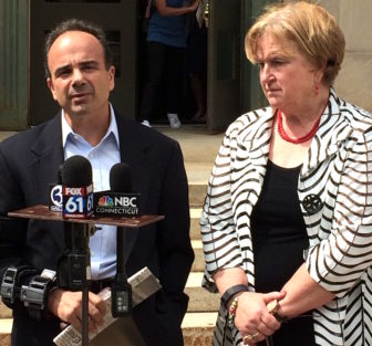 Bridgeport Mayor Joseph Ganim and School Supt. Fran Rabinowitz react to the decision outside Hartford Superior Court.