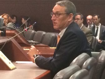 State budget director Benjamin Barnes answers questions from members of the state Spending Cap Commission.