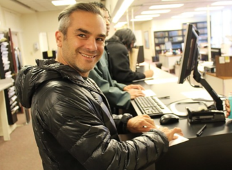 Ben Berkowitz completes an absentee ballot Monday in the New Haven City Clerk’s office.