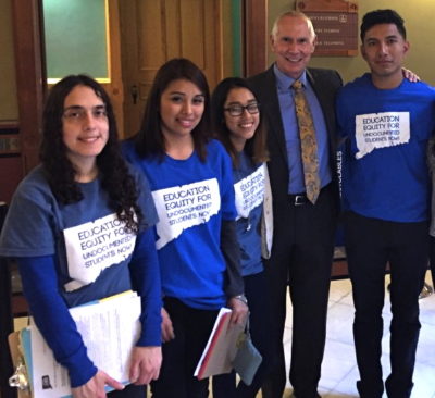 CSCU President Mark Ojakian poses for a picture with so-called "Dreamers" at the state capitol, where he lobbied for undocumented immigrants to get financial aid.