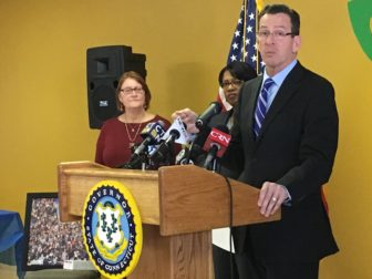 Gov. Dannel P. Malloy announces proposals to combat the opioid epidemic on Jan. 26, 2017. He stands with Miriam Delphin-Rittmon, commissioner of the Department of Mental Health and Addiction Services, and Karen Zaorski, whose son died of a cocaine overdose.