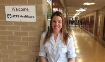 Julia Cooper, who supervises school-based health centers for United Family & Community Services, outside the clinic at Kelly Middle School.