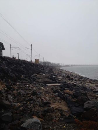 Storm Sandy washed out the boulders fortifying the embankment supporting the rail line in Niantic and separating it from Long Island Sound, on the right.