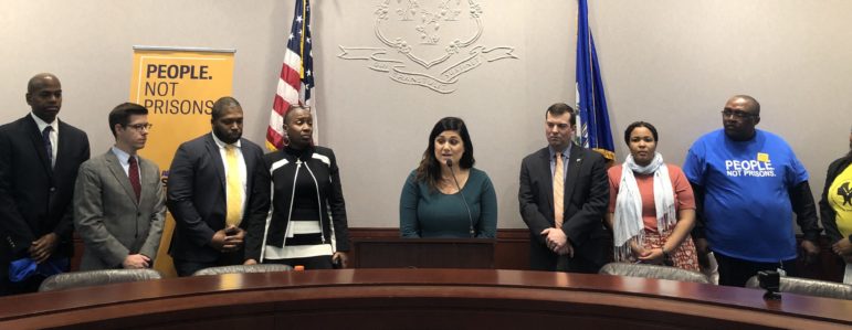 ACLU criminal justice organizer Sandy LoMonico speaks at a press conference on Thursday