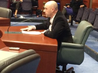 Brian Essenter, a medical marijuana counselor, speaks out in favor of the bill Monday.