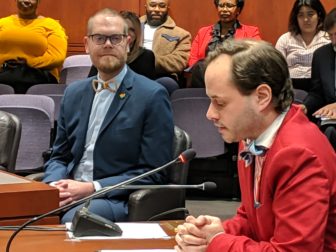 Patrick J. Dunn, executive director of the New Haven Pride Center, spoke up at a March hearing in favor of the bill a that would establish a health and human services network for the LGBTQ community. Rep. Jeff Currey, at left, co-introduced the bill. The bill was approved Monday by the House.