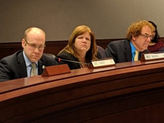 Rep. Devin Carney, R-Lyme, raises questions about the "end game" of the governor's proposed Commission on Shared School Services. To his left is REp. Irene Haines, R-East Haddam.