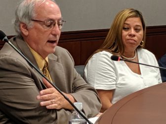 Tom Hennick, public education officer of the Freedom of Information Commission addresses the group. Maria Cordeiro, a Berlin grandmother, is at right.