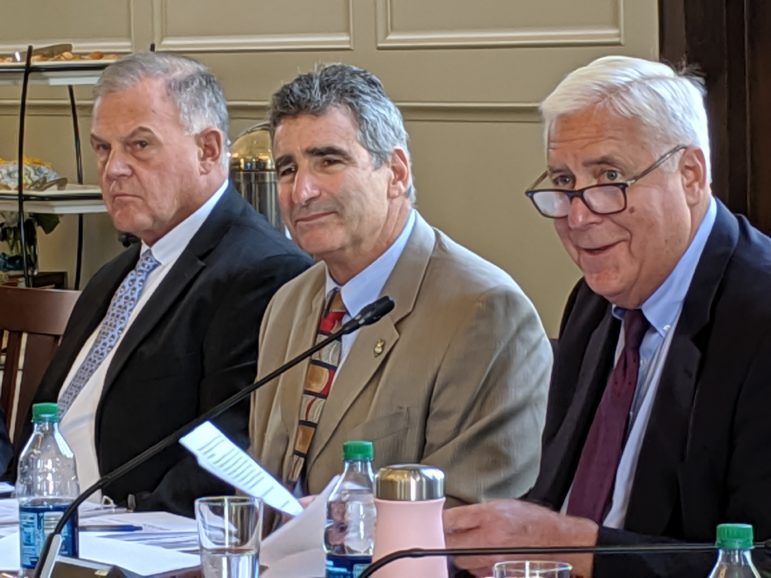 UConn President Tom Katsouleas, center, attended his first UConn board meeting Wednesday. At left is trustee member Andy Bessette and at right interim chairman, Tom Ritter.